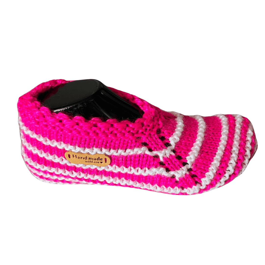 Pink and white striped knitted slipper on a white background